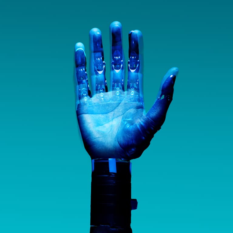 Mechanic hand with superimposed palm.